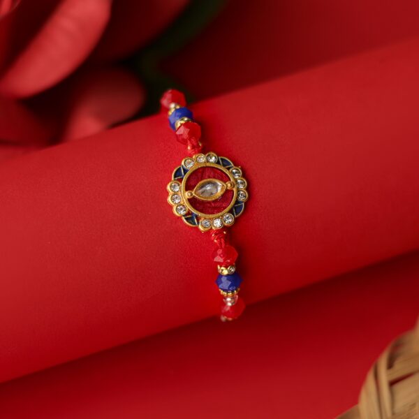 Royal Kundan Rakhi with Red & Blue Beads