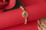 Peacock Feather Rakhi with Ganesha Charm
