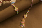 Rangilo Saath Bhaiya-Bhabhi Rakhi Set by UtsavArts – A Splash of Love & Color