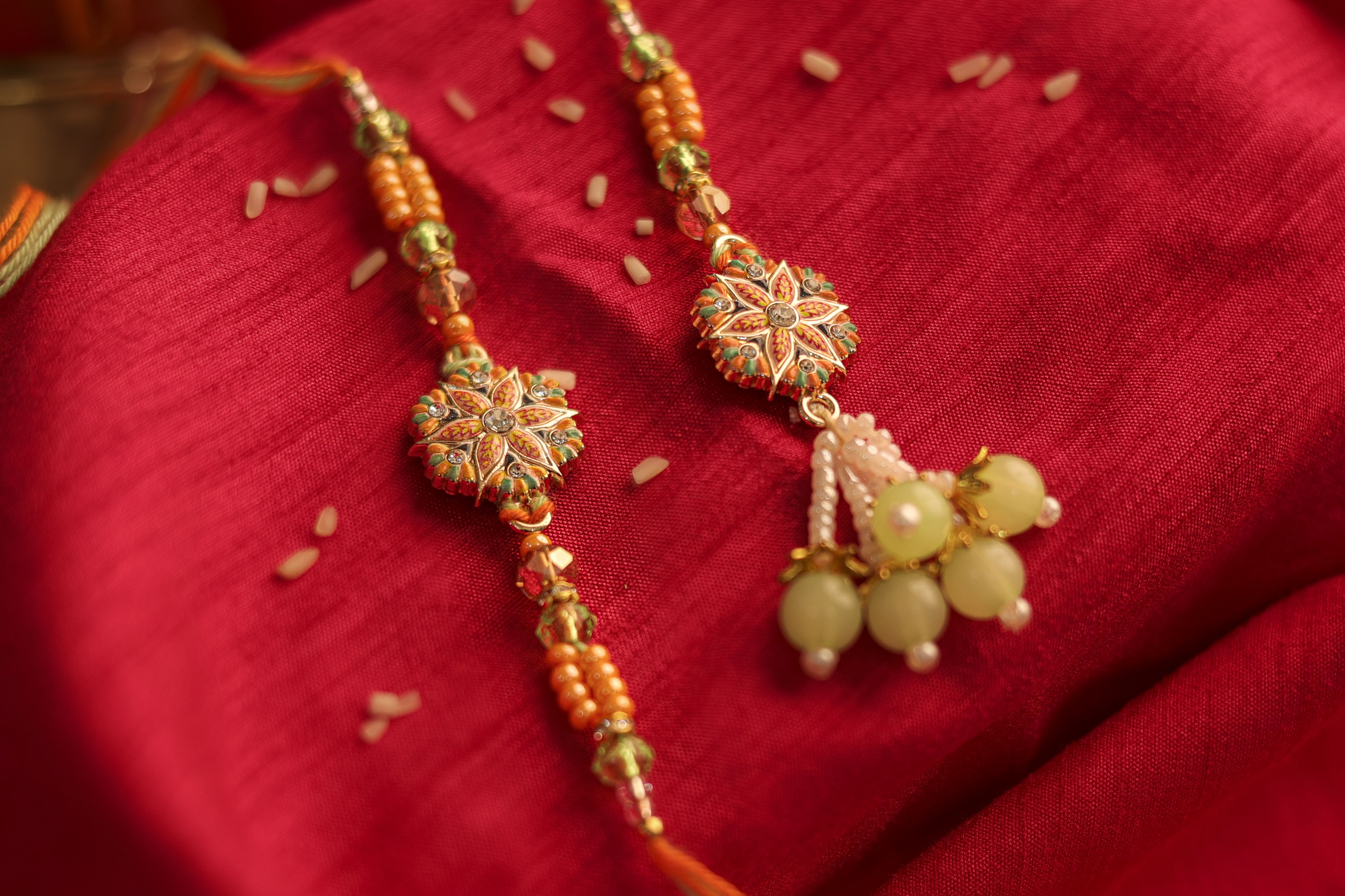 Floral Enamel Bhaiya Bhabhi Rakhi with Beaded Latkan