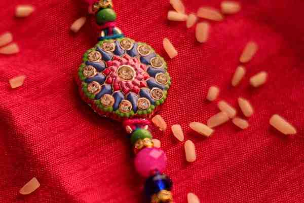 Vibrant Floral Tassel Bhaiya Bhabhi Rakhi