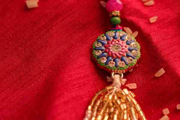 Vibrant Floral Tassel Bhaiya Bhabhi Rakhi