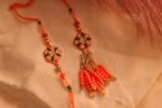 Vibrant Orange Bhaiya Bhabhi Rakhi Pair