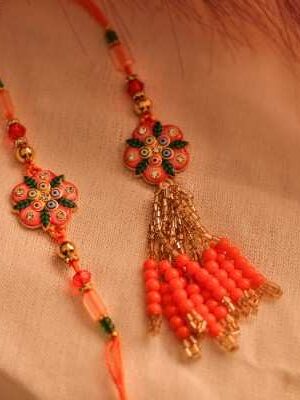 Vibrant Orange Bhaiya Bhabhi Rakhi Pair