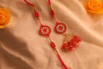 Elegant Red Crystal Bhaiya Bhabhi Rakhi Pair