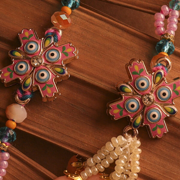 Nazar Suraksha Bhaiya-Bhabhi Rakhi Set by UtsavArts – Vibrant Protection, Handcrafted with Love