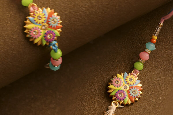 Rangilo Saath Bhaiya-Bhabhi Rakhi Set by UtsavArts – A Splash of Love & Color